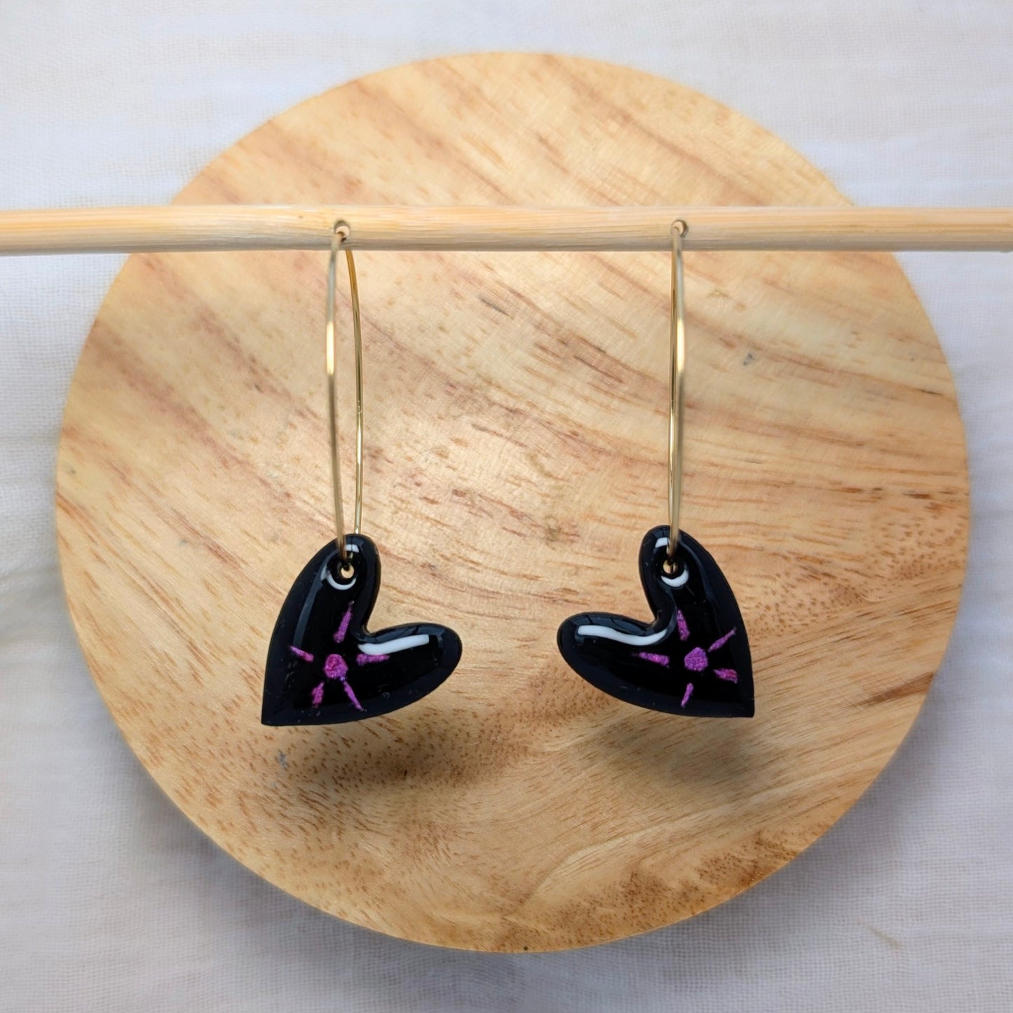 Boucles d'oreilles cœur noir / soleil rose